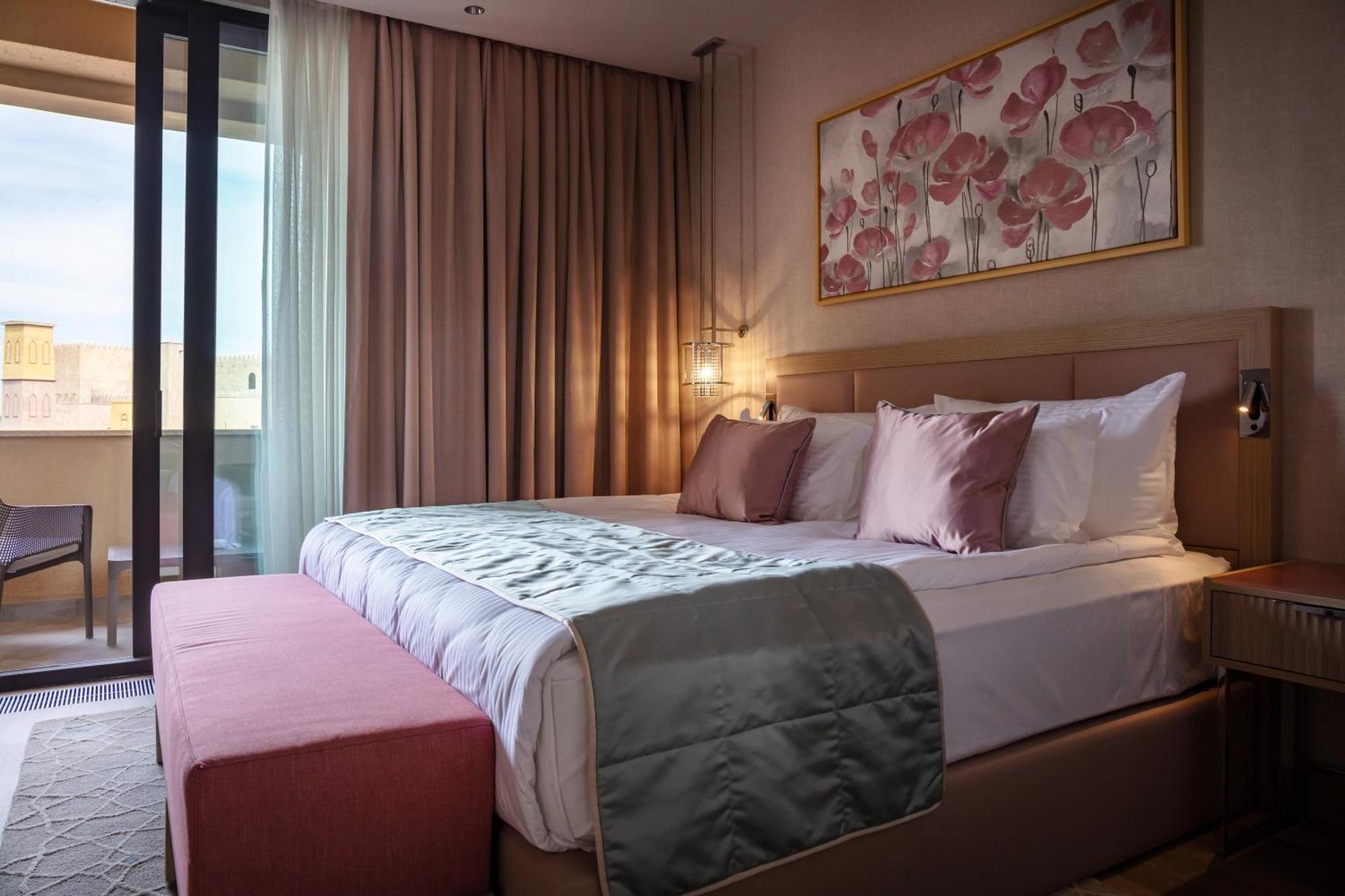 Karavansaray Turkistan Harbour Hotel -Flying Theatre Access 외부 사진 A bedroom at the hotel